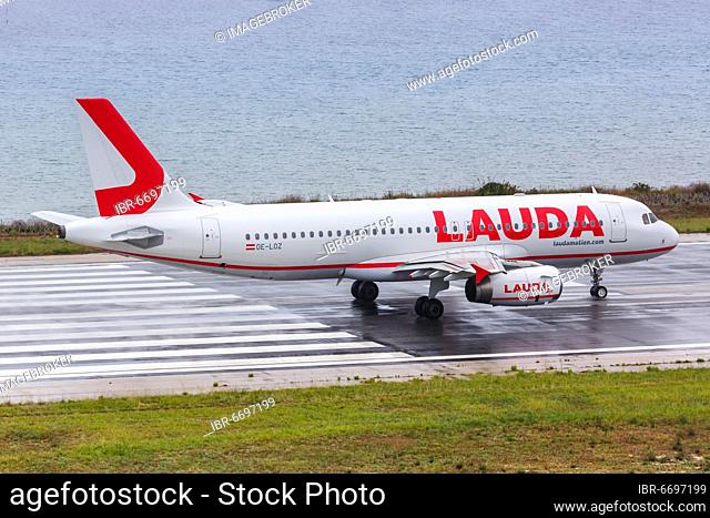 A Lauda Airbus A320 aircraft with registration number OE-LOZ at Corfu Airport, Greece, Europe