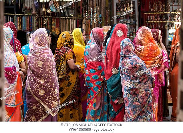 Women in colourful saris during a religous festival in Pushkar, Rajasthan