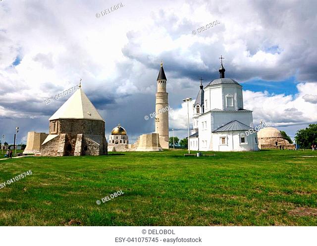 The unity of religions, the Christian Church and the minaret of the mosque of Bolgar city, Russia