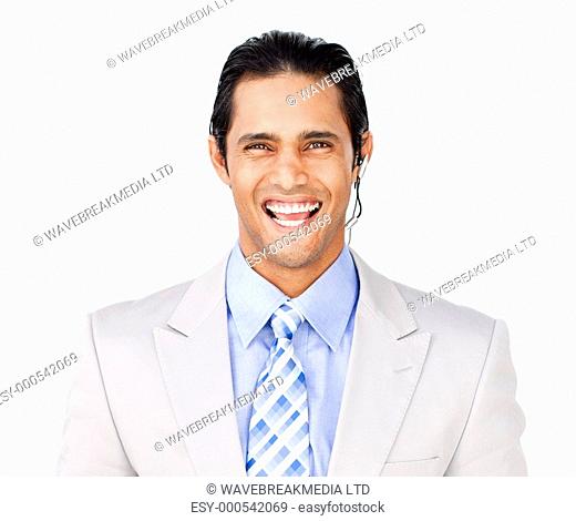 Smiling businessman with headset on against a white background