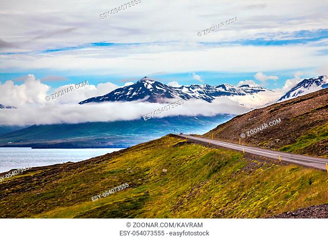 The main highway in Iceland on the Atlantic coast. The concept of extreme northern tourism. Summer tour in the Nordic countries