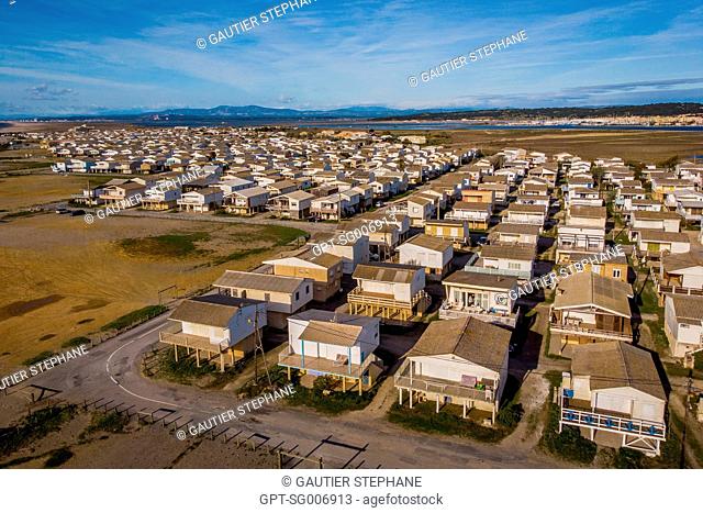AERIAL VIEW OF THE BARAQUES, THE WOOD CHALETS BUILT ON PILES, GRUISSAN, AUDE (11), FRANCE