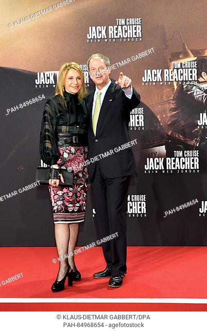 John B. Emerson (R), US ambassador to Germany, and his wife Kimberly arrive for the film premiere of 'Jack Reacher: Never Go Back' in Berlin, Germany