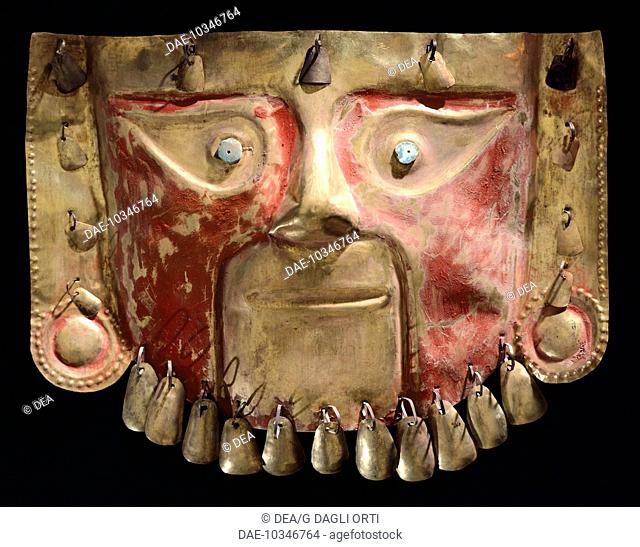 Gold funerary mask adorned with pendants, artifacts originating from Peru. Pre-Inca Chimu Civilization, 14th Century.  Lima