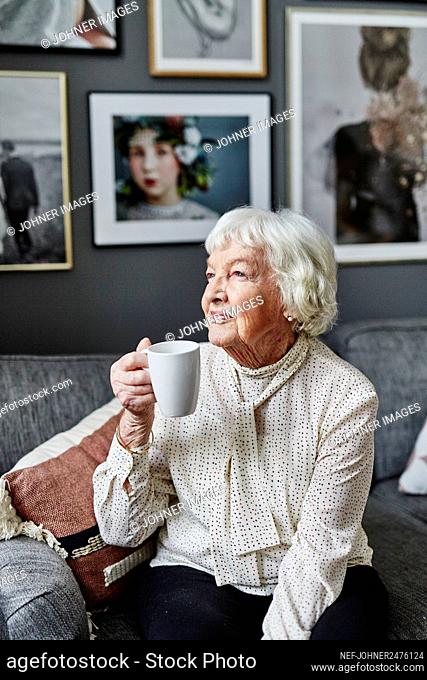 Senior woman holding mug