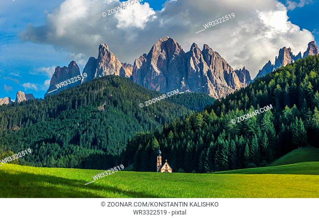 St. John church in front of the Odle mountains, Funes Valley, Dolomites, Italy