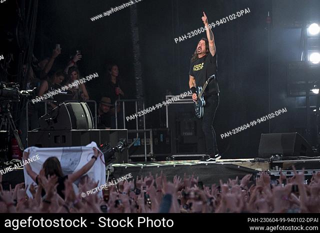 04 June 2023, Bavaria, Nuremberg: Dave Grohl stands during the performance of the Foo Fighters on the Utopia Stage at the closing of the open-air festival Rock...