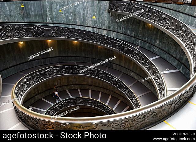 Reopening of the Vatican Museums in phase two after the lock-down due to the Coronavirus emergency (Covid-19). Tourists with protective masks go down a...