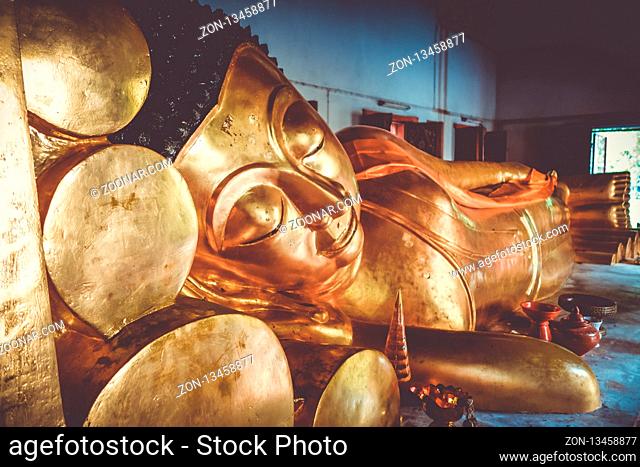 Gold Buddha statue in Wat Phra Singh temple, Chiang Mai, Thailand