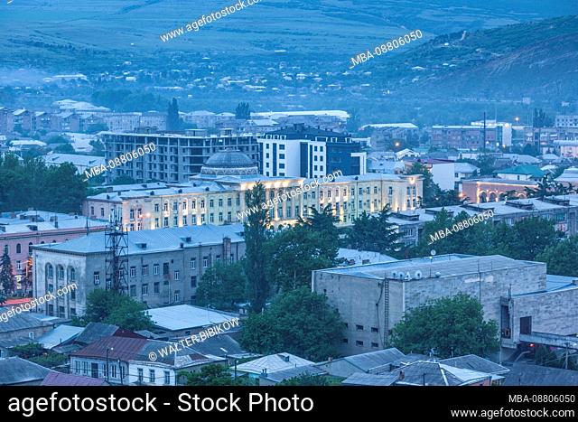 Georgia, Gori, elevated town view from Gori Fortress, dusk