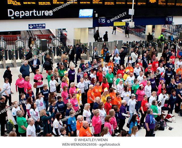 London Hospices Choir Flash Mob Waterloo promoting Christmas single ‘The Living Years’ at Waterloo Station Featuring: Atmosphere, View Where: London