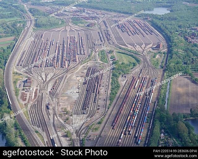 11 May 2022, Lower Saxony, Seevetal: Freight trains stand at the Maschen marshalling yard. The marshalling yard south of Hamburg is the largest marshalling yard...