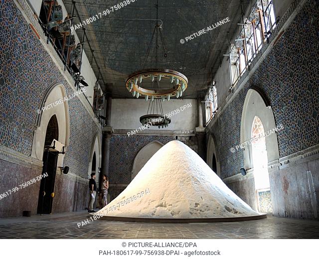 16 June 2018,  Italy, Palermo: The art work of the Dutch artist Patricia Kaersenhout - a mountain of salt - at the Palazzo Forcella De Seta in Palermo