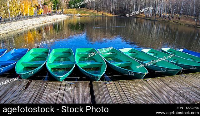 Boat station closed at the end of the season. Pond in the landscape reserve Teply Stan, Moscow, Russia. The beginning of November