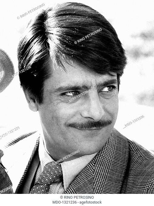 Giancarlo Giannini on the movie set of 'The Sensual Man'. The Italian actor and voice actor Giancarlo Giannini smiling on the set of the film 'The Sensual Man'