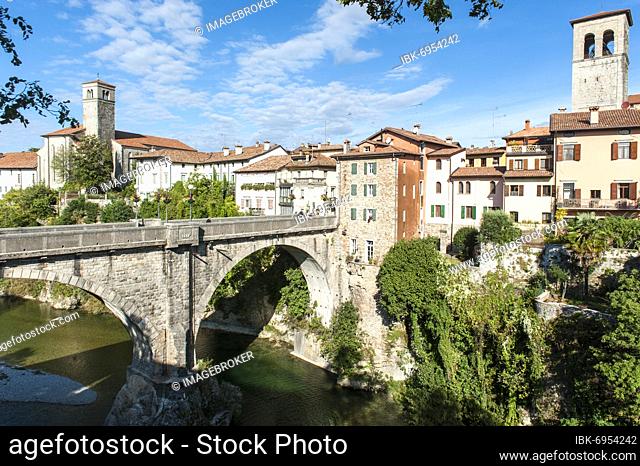 City view, Devil's Bridge over the Natisone River, Ponte Diavolo, Campanile, Santa Maria Assunta Cathedral on the right, Assumption of the Virgin Mary