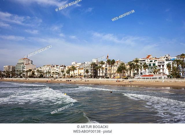 Spain, Catalonia, Sitges, coastal town and beach at Mediterranean Sea