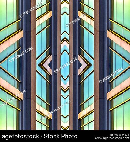 Shiny teal windows of an office building. Geometric kaleidoscope pattern on mirrored axis of symmetry reflection. Colorful shapes as a wallpaper for advertising...