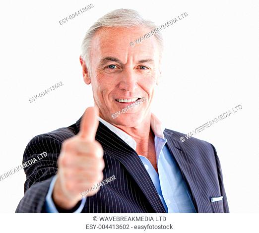Successful senior businessman with a thumb up