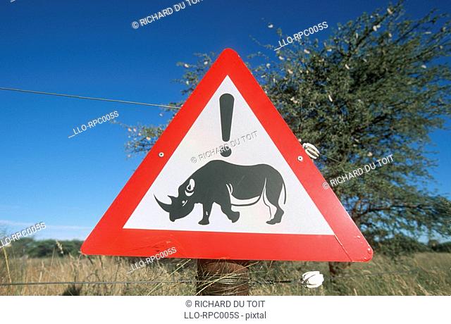Beware of rhino signpost. Vaalbos National Park, Northern Cape Province, South Africa