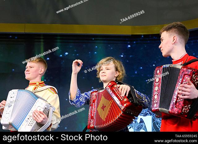 RUSSIA, MOSCOW - DECEMBER 21, 2023: Musicians perform at the opening of Arkhangelsk Region Day during the Russia Expo international exhibition and forum at the...