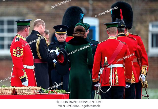 The Duke of Cambridge, Colonel of the Irish Guards, accompanied by The Duchess of Cambridge, present shamrocks to the 1st Battalion Irish Guards at the St