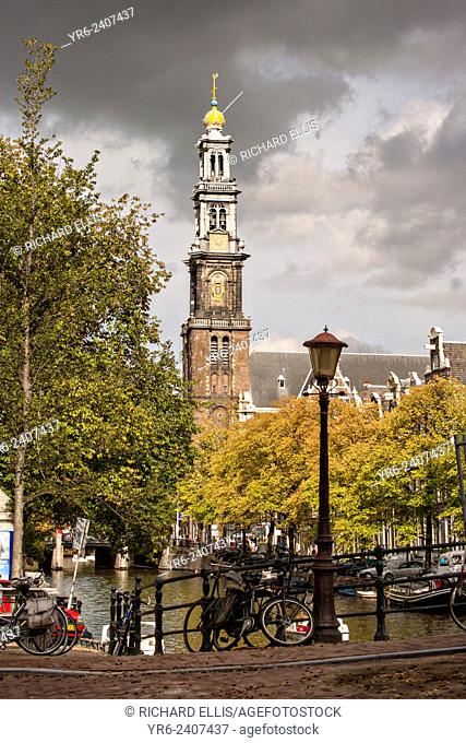 Hemonybrug bridge at Keizersgracht and Leidsegracht with Westerkerk tower in Amsterdam