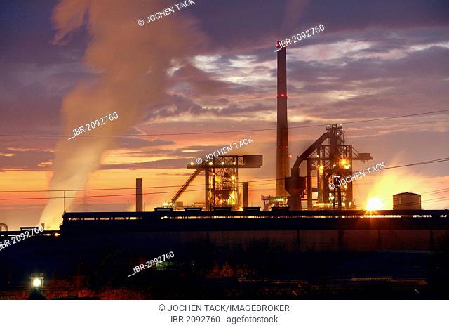 Blast furnaces of Huettenwerke Krupp Mannesmann, HKM Steelworks, at sunset, Duisburg, North Rhine-Westphalia, Germany, Europe