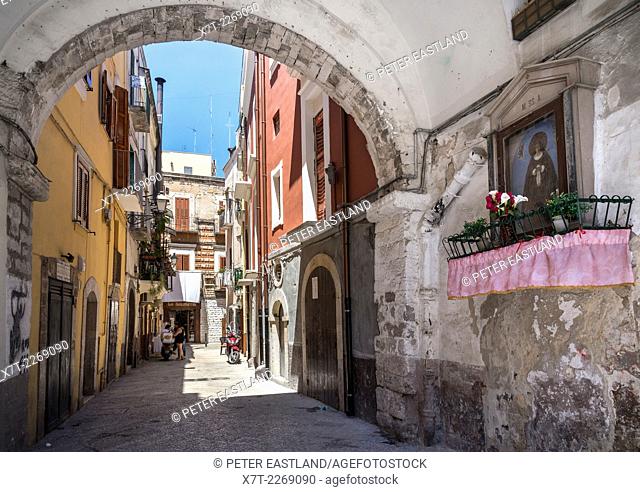 A typical street shrine and side alley in Barivecchia, Bari old town, Puglia, Southern Italy