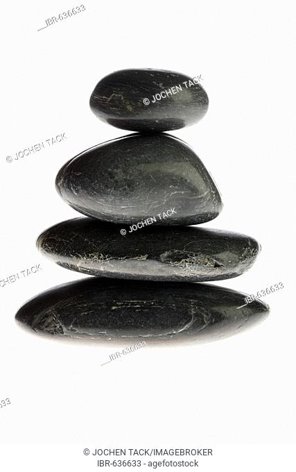 Smooth pebbles, stacked, in-studio still-life shot