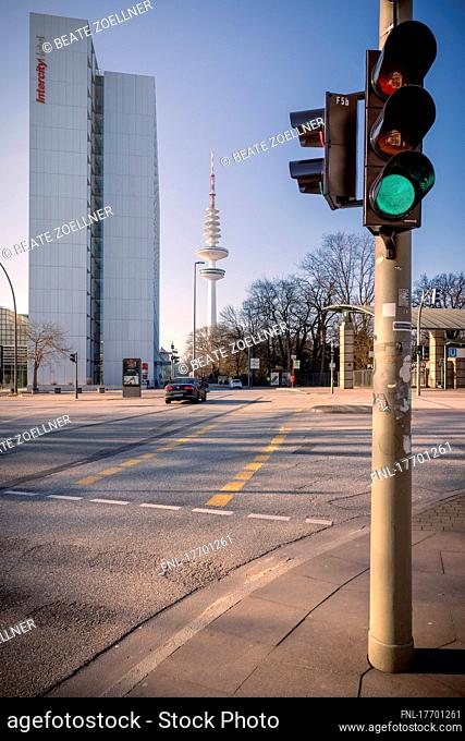 Crossroads in Hamburg between exhibition halls and Planten un Blomen, in the middle the TV tower shines in the spring sunshine