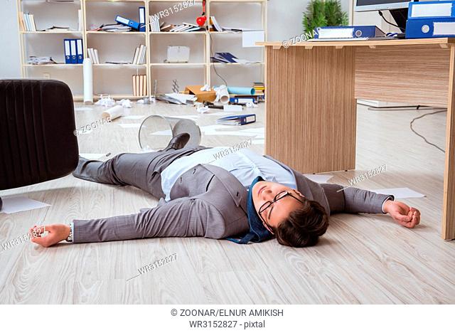 Businessman dead on the office floor