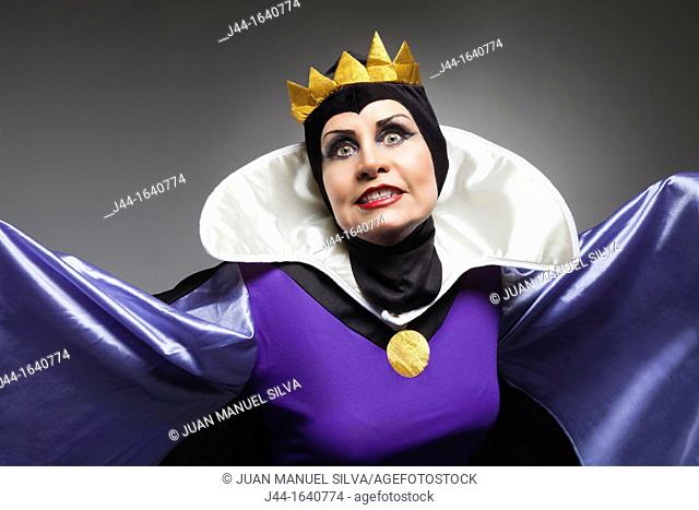 Mature woman wearing the evil queen costume