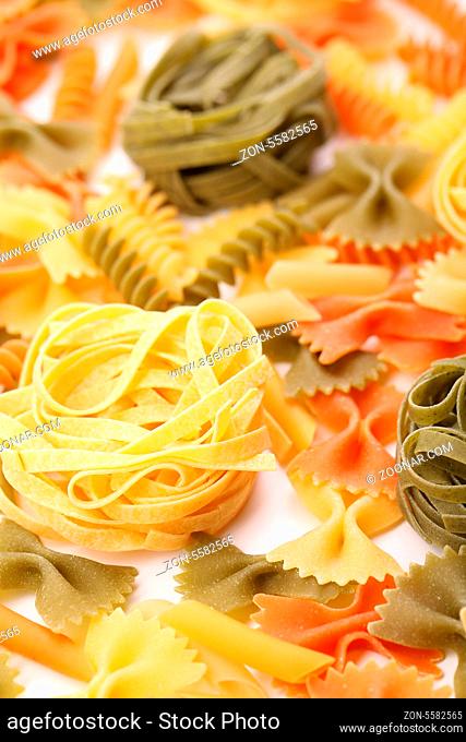 different pasta in three colors. Close-up. Background