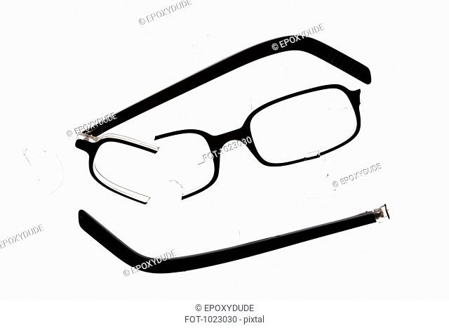 A broken pair of glasses