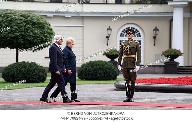 German President Frank-Walter Steinmeier being greeted with military honours by the President of the Republic of Lithuania, Dalia Grybauskaite, in Vilnius