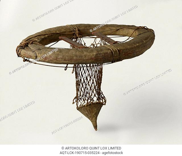 Life Buoy, Large oval floating belt, made of textile, probably filled with a wooden frame and cork and straw. Two cables run parallel between the outer edges of...