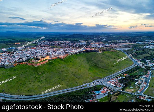 Elvas cityscape drone aerial panoramic view with beautiful green landscape of Alentejo, in Portugal