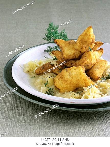 Potato Friggele a type of fritter with sauerkraut