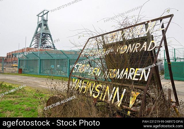 19 December 2023, Lower Saxony, Salzgitter: A ""Stop the nuclear madness"" sign stands on the site of the Konrad mine. In May 2021