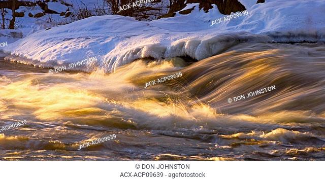 Evening light on rapids in Vermilion River, Naughton, Ontario, Canada