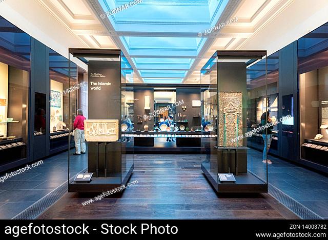 London, United Kingdom - May 13, 2019: The British Museum, London. Islamic art exhibition, archeological artifacts, visitors and tourists admiring the...