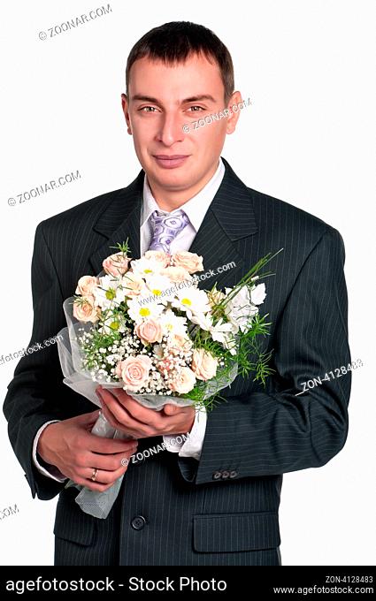 Portrait of happy groom on white background