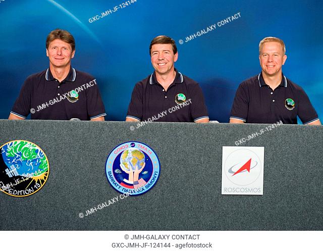 Cosmonaut Gennady Padalka (left), Expedition 19 commander; along with astronauts Michael Barratt and Tim Kopra, both flight engineers