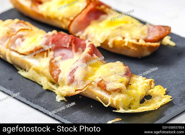 baguette baked with ham and cheese