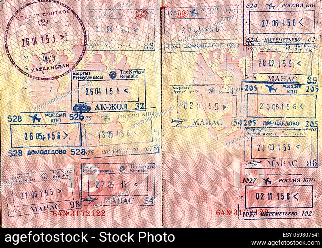 Travel background from Russian passport pages with visa stamps