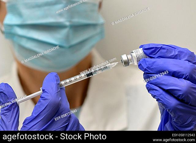 Romania, Galati, 08. 02. 2021 Pfizer and BioNTech Covid-19 vaccine. Small ampoules with vaccine