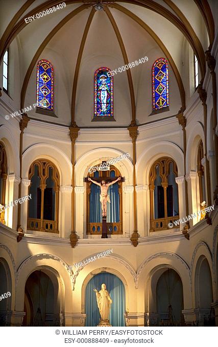 Stained Glass, Christ Crucifix, Mary Statue, Notre Dame Cathedral, Nha Tho Duc Ba, built in 1883 largest cathedral in French Empire Saigon Ho Chi Minh City...