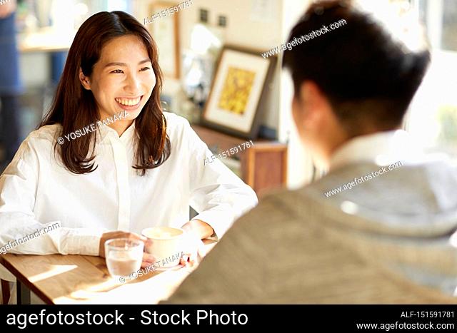 Young Japanese couple at a cafe