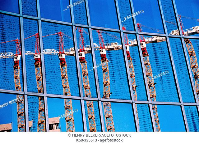 Reflection of construction cranes, Netherlands